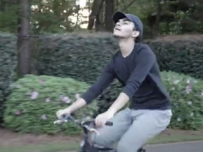 Sauriyan Sapkota is riding a bicycle in the scene.